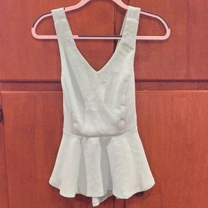 Light blue peplum cross back top